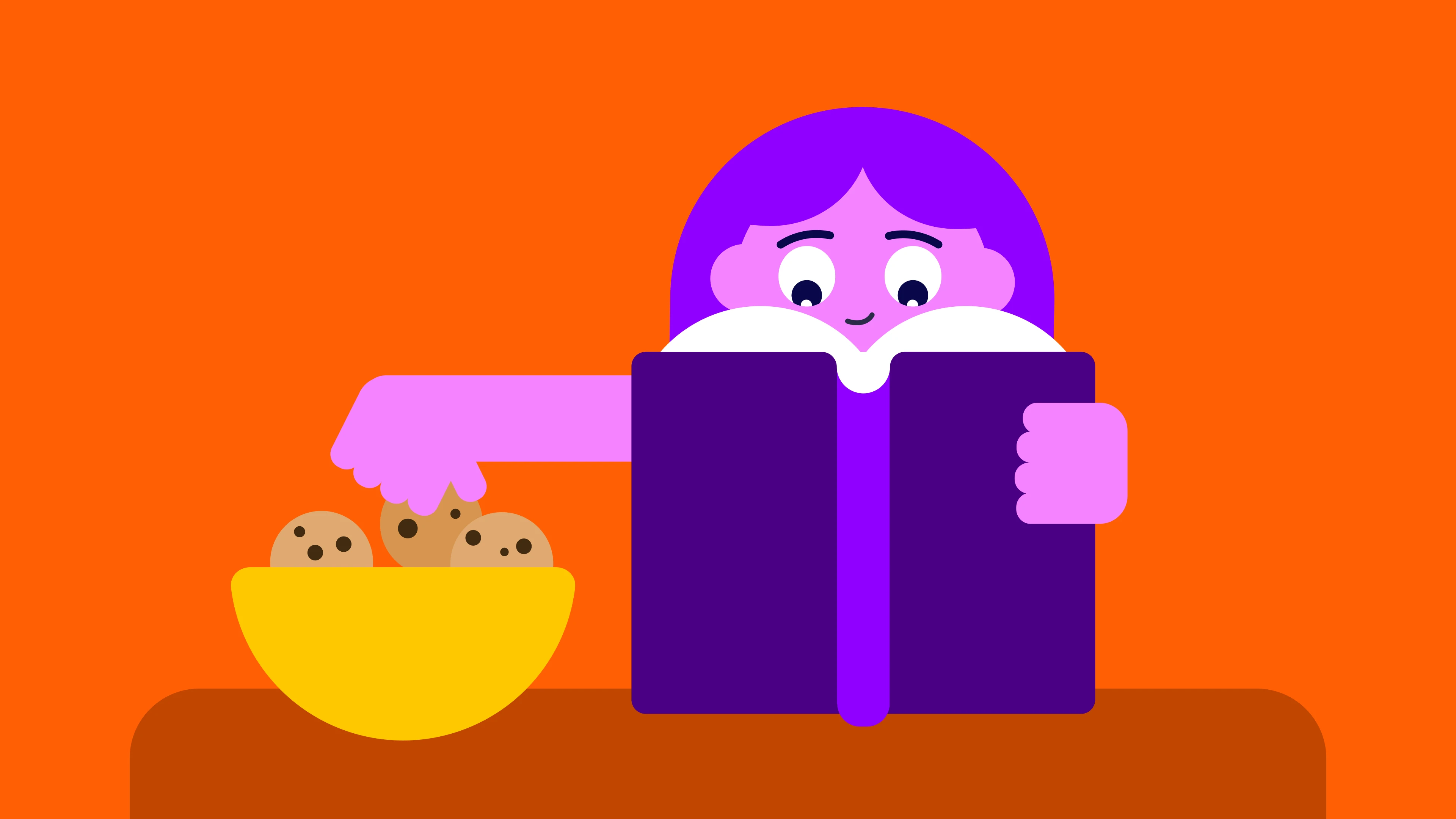 girl reading a book and eating cookies