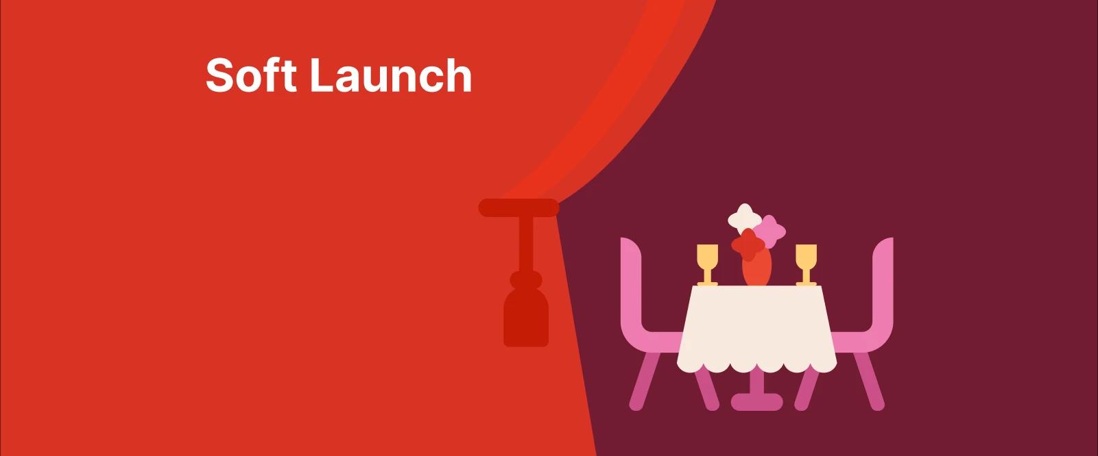 Soft launch - A round table set for two with wine glasses and flowers beside a drawn curtain